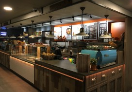 Bespoke servery counter made from Corian worktop, karndean vinyl planking frontage, mild steel trims and LED strip lighting