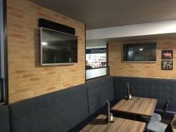 Brick effect panel walling with cream jointing with mild steel trims