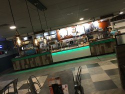 Bespoke servery counter made from Corian worktop, karndean vinyl planking frontage, mild steel trims, LED strip lighting and vinyl tile flooring