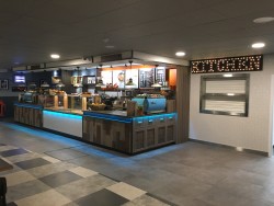 Bespoke servery counter made from Corian worktop, karndean vinyl planking frontage, mild steel trims and LED strip lighting
